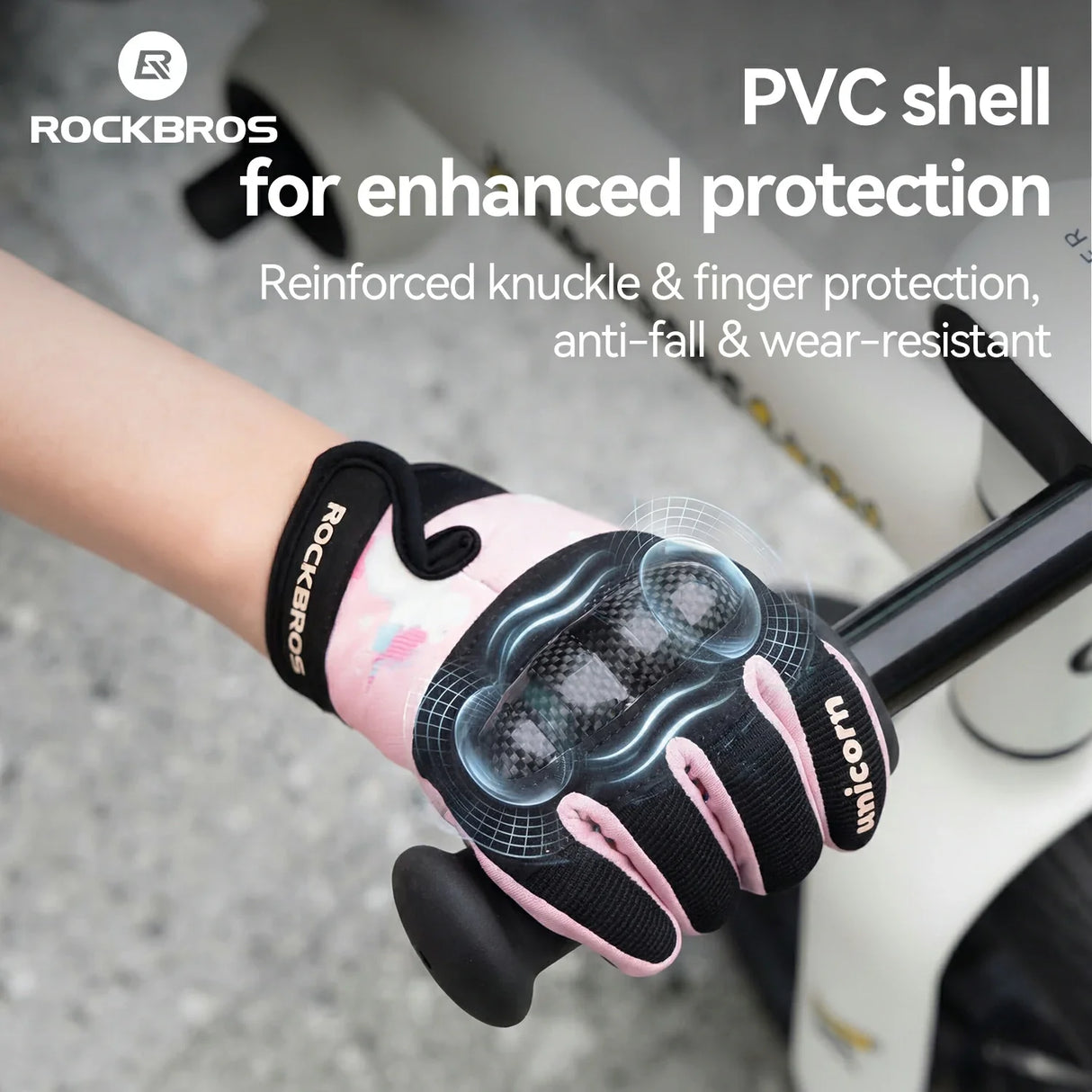 Pink and black glove with 'RockBros' branding on a blurred background