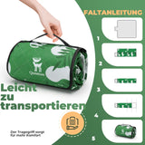zusammengefaltete picknickdecke mit tragegriff